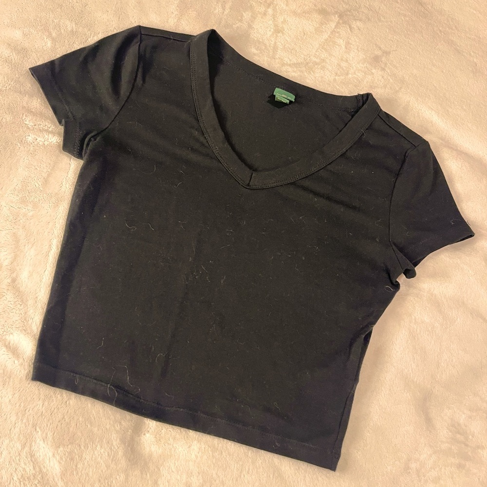 Black fitted top with sleeve